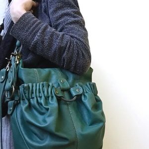 Women’s turquoise leather handbag